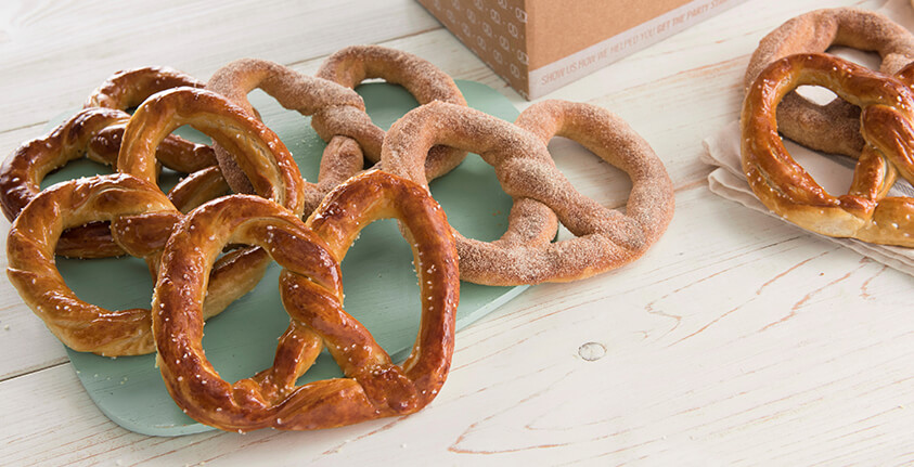 7 cinnamon sugar & salty pretzels arranged on a table